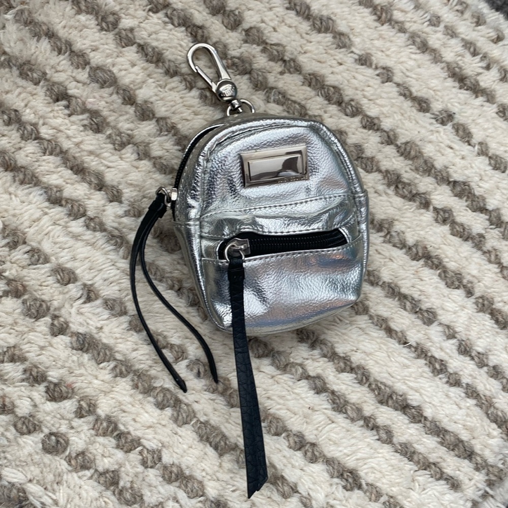 Silver Juicy Couture mini backpack wallet